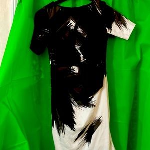 A dress, short sleeved , mid length great for spring or summer